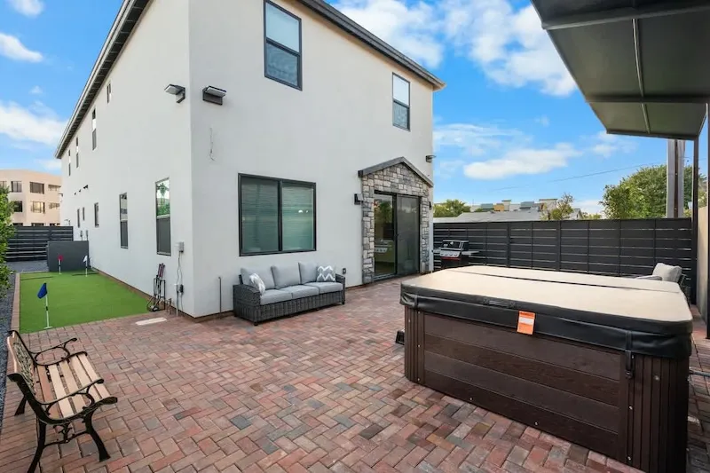 Private backyard and hot tub at Tempe Hub